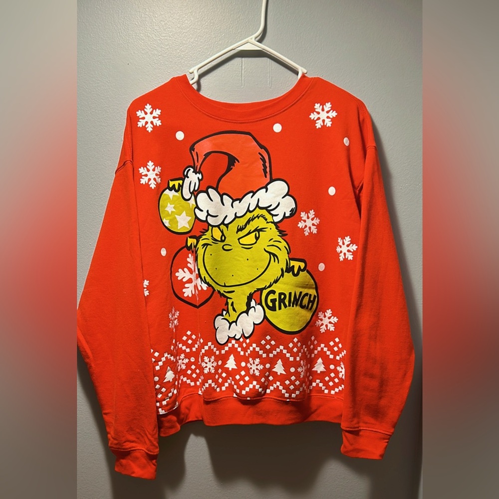 Grinch-themed Christmas pullover sweatshirt , ideal for holiday festivities.